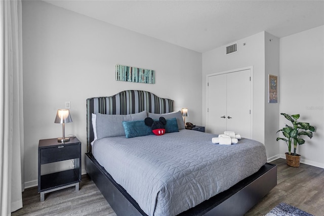 225 Celebration Pl Unit 427, Celebration, FL 34747 - bedroom featuring wood finished floors