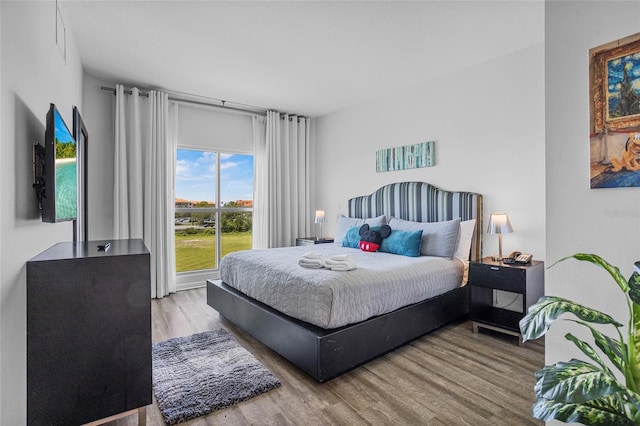 225 Celebration Pl Unit 427, Celebration, FL 34747 - bedroom with wood finished floors