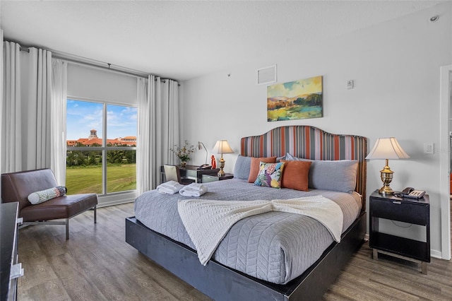 225 Celebration Pl Unit 427, Celebration, FL 34747 - bedroom featuring wood finished floors