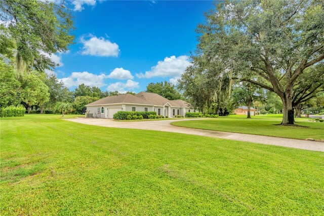 view of yard featuring a garage