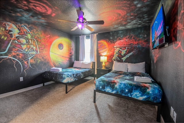 carpeted bedroom with a textured ceiling and ceiling fan