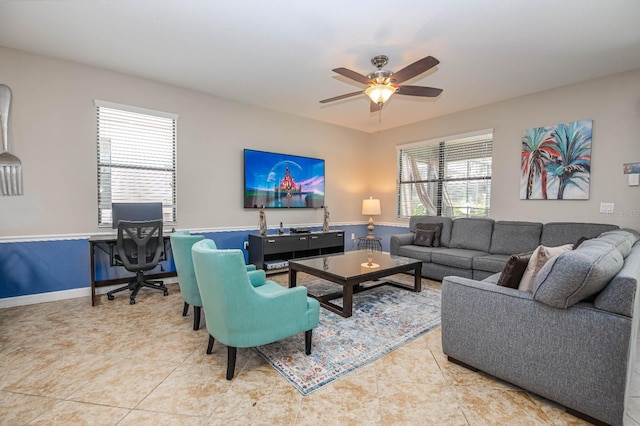 tiled living room featuring ceiling fan