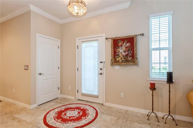 foyer entrance featuring ornamental molding