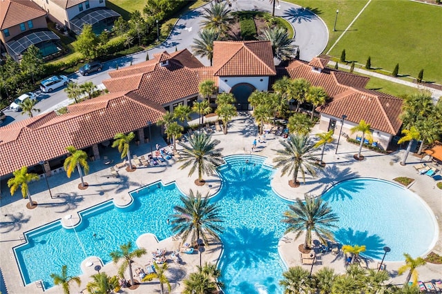 view of swimming pool featuring a patio area