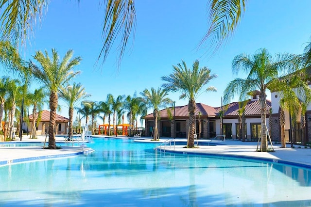 pool featuring a patio area