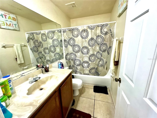 full bathroom with vanity, toilet, shower / tub combo with curtain, and tile patterned floors