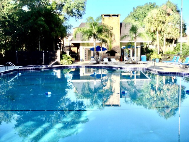 pool with a patio