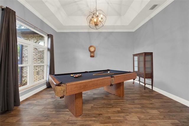 game room featuring dark hardwood / wood-style floors, billiards, ornamental molding, and a tray ceiling