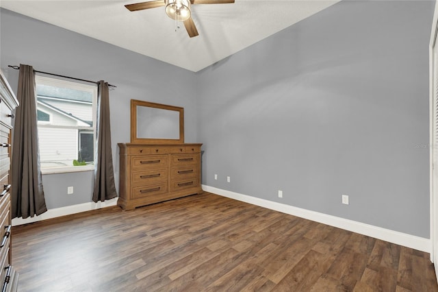 spare room featuring hardwood / wood-style floors and ceiling fan