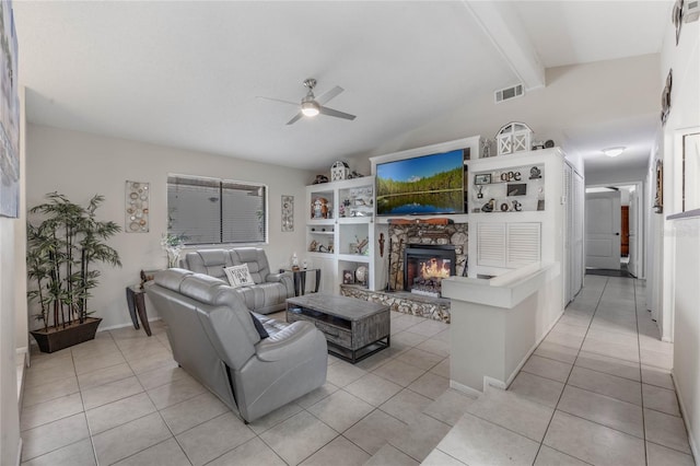 tiled living room with ceiling fan, a fireplace, and lofted ceiling with beams