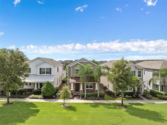 view of front of home with a front yard