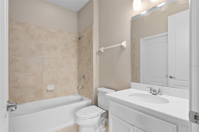 full bathroom featuring washtub / shower combination, vanity, and toilet