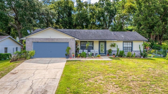 ranch-style home featuring a garage, a porch, and a front lawn