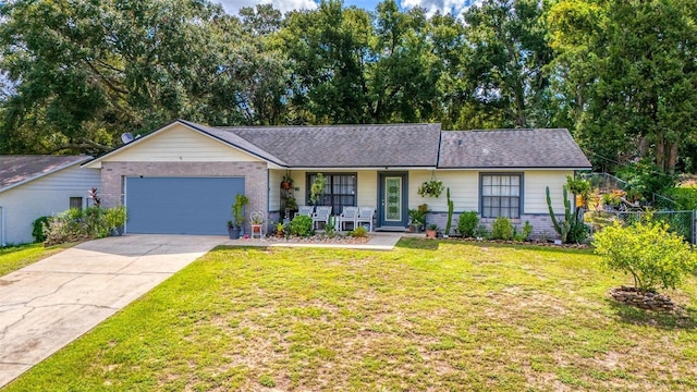 single story home with a front yard, a garage, and a porch