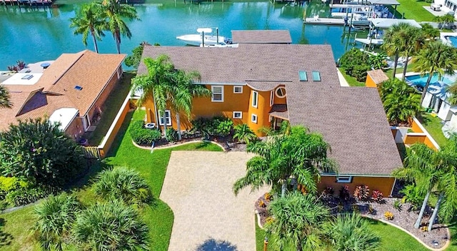 drone / aerial view with a water view