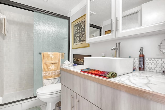 bathroom featuring tile patterned floors, walk in shower, toilet, and vanity