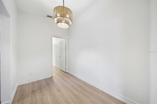 empty room with light wood-type flooring