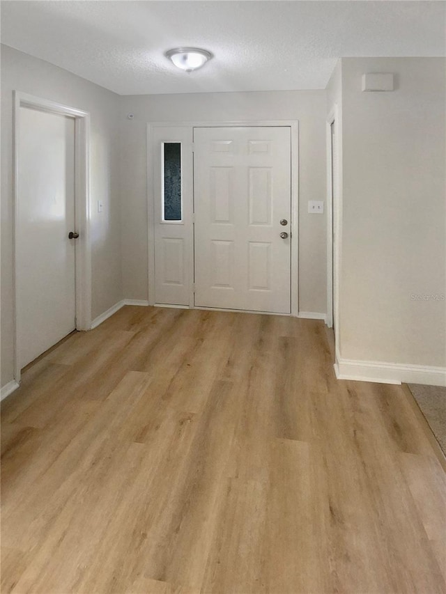 entrance foyer featuring light wood-type flooring