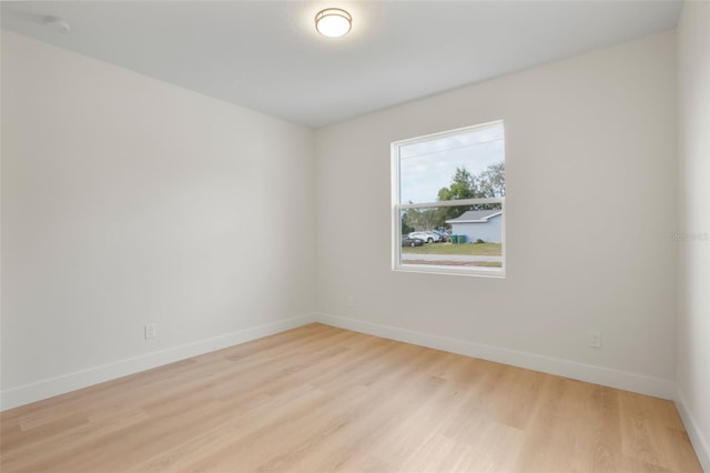 unfurnished room featuring light hardwood / wood-style flooring