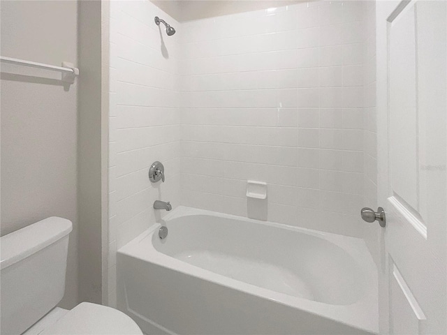 full bath featuring shower / tub combination and toilet