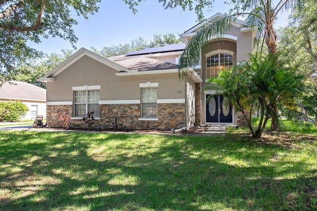 view of front facade with a front lawn