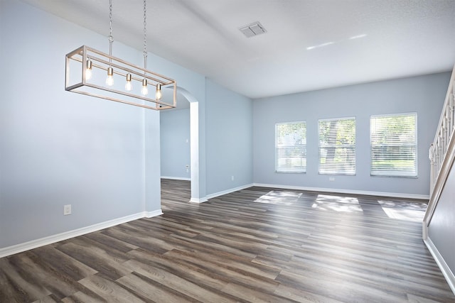 interior space with dark hardwood / wood-style flooring