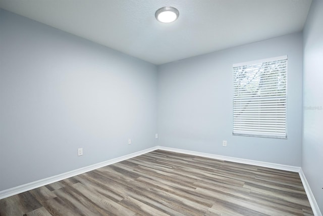 empty room featuring hardwood / wood-style floors