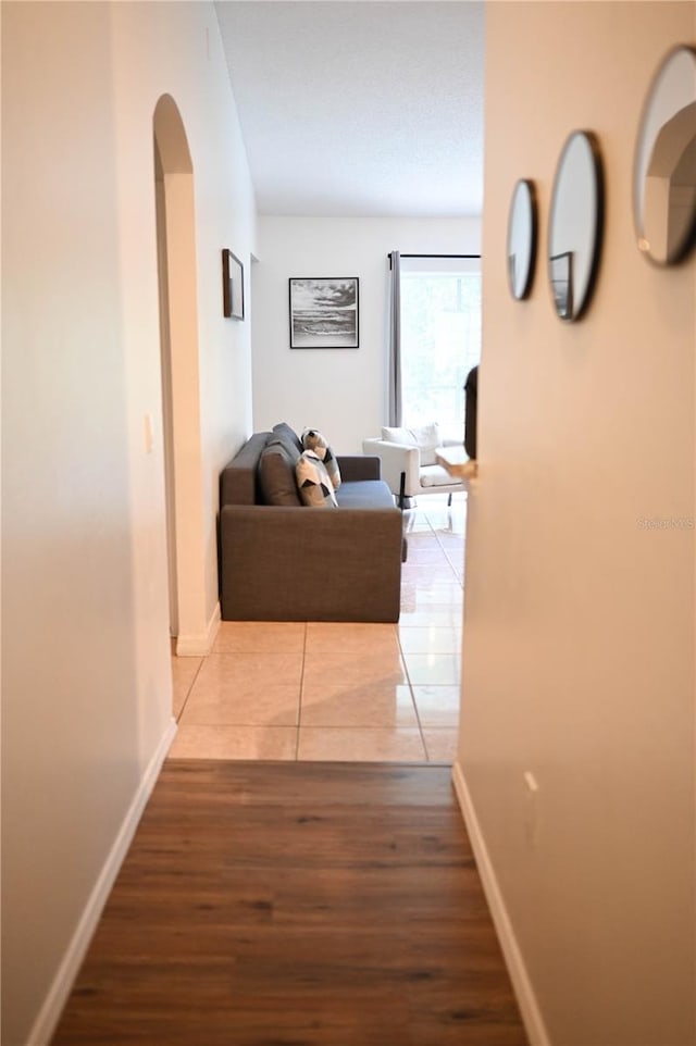 corridor featuring hardwood / wood-style flooring