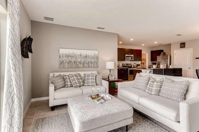 living room featuring light tile patterned floors