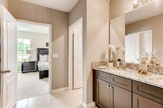 bathroom with vanity and tile patterned floors