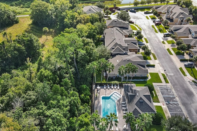 birds eye view of property with a residential view