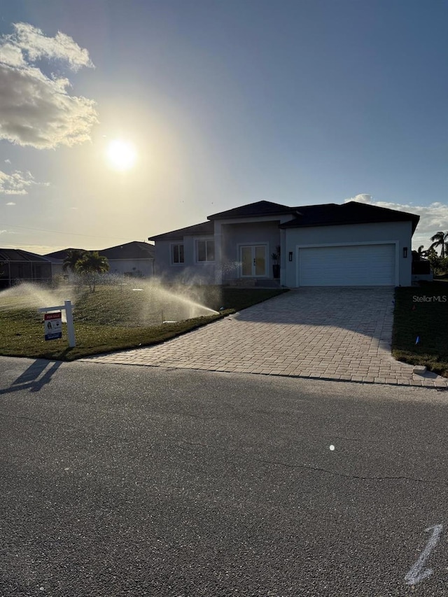 view of front of home with a garage