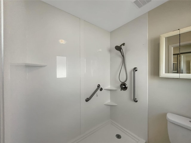 full bath featuring visible vents, toilet, and walk in shower