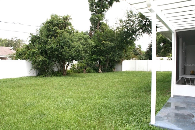 view of yard featuring fence