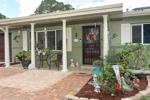 property entrance with a porch