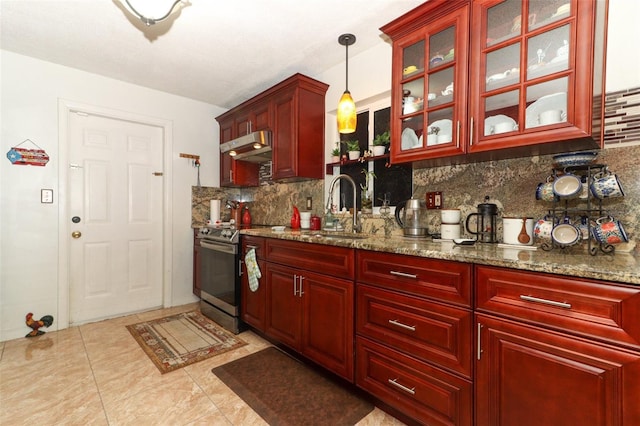 kitchen with decorative light fixtures, light tile patterned floors, stainless steel electric range, sink, and decorative backsplash