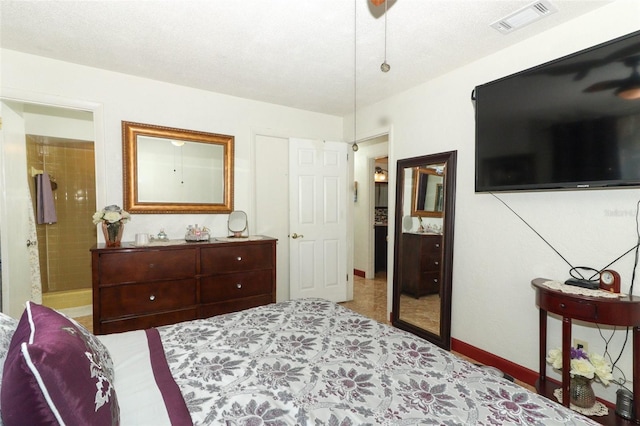 bedroom featuring a textured ceiling