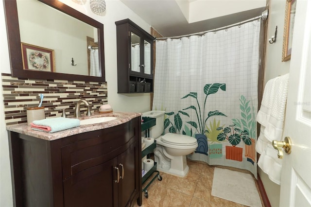 bathroom featuring a shower with shower curtain, tile patterned flooring, toilet, decorative backsplash, and vanity