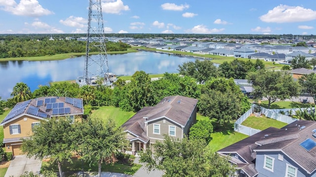 birds eye view of property with a residential view and a water view