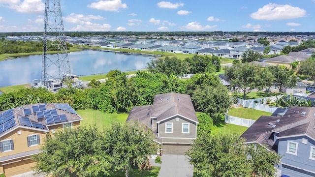 aerial view featuring a water view and a residential view