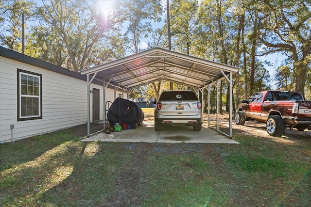 view of parking / parking lot featuring a lawn and a carport