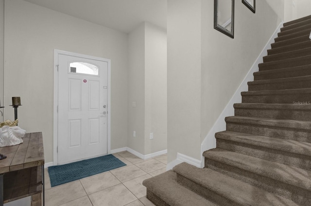 entrance foyer with light tile patterned floors