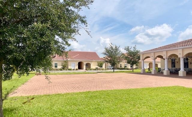 view of community featuring a lawn