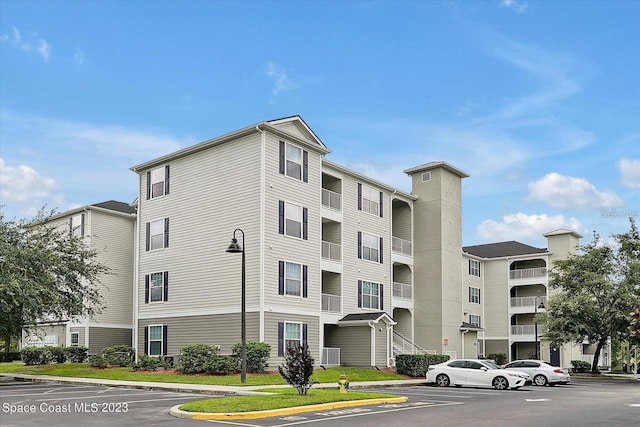 view of property featuring central AC unit