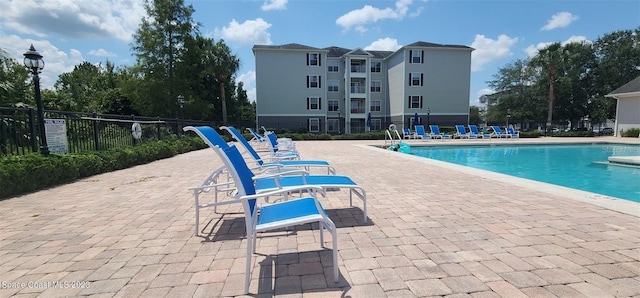 view of swimming pool featuring a patio