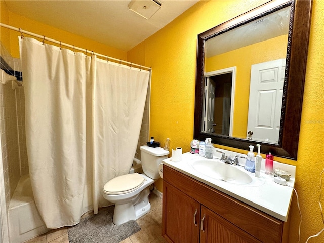 full bathroom featuring vanity, toilet, tile patterned floors, and shower / bath combo