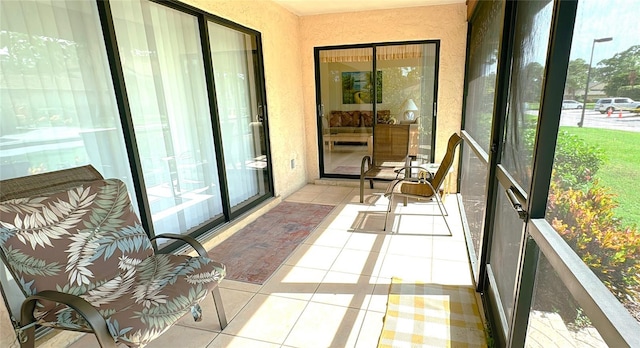 sunroom / solarium featuring a wealth of natural light