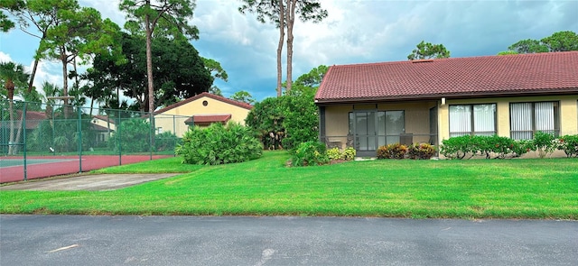 view of front facade with a front lawn