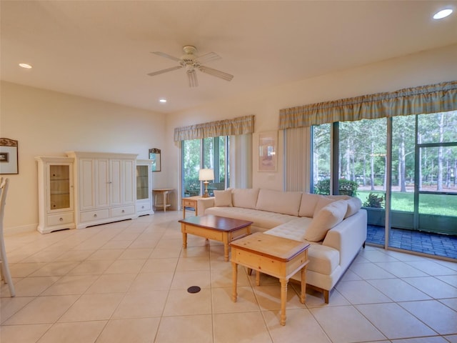 living room with light tile patterned floors, ceiling fan, and recessed lighting