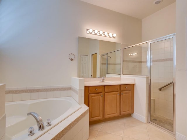 bathroom featuring tile patterned flooring, separate shower and tub, and vanity